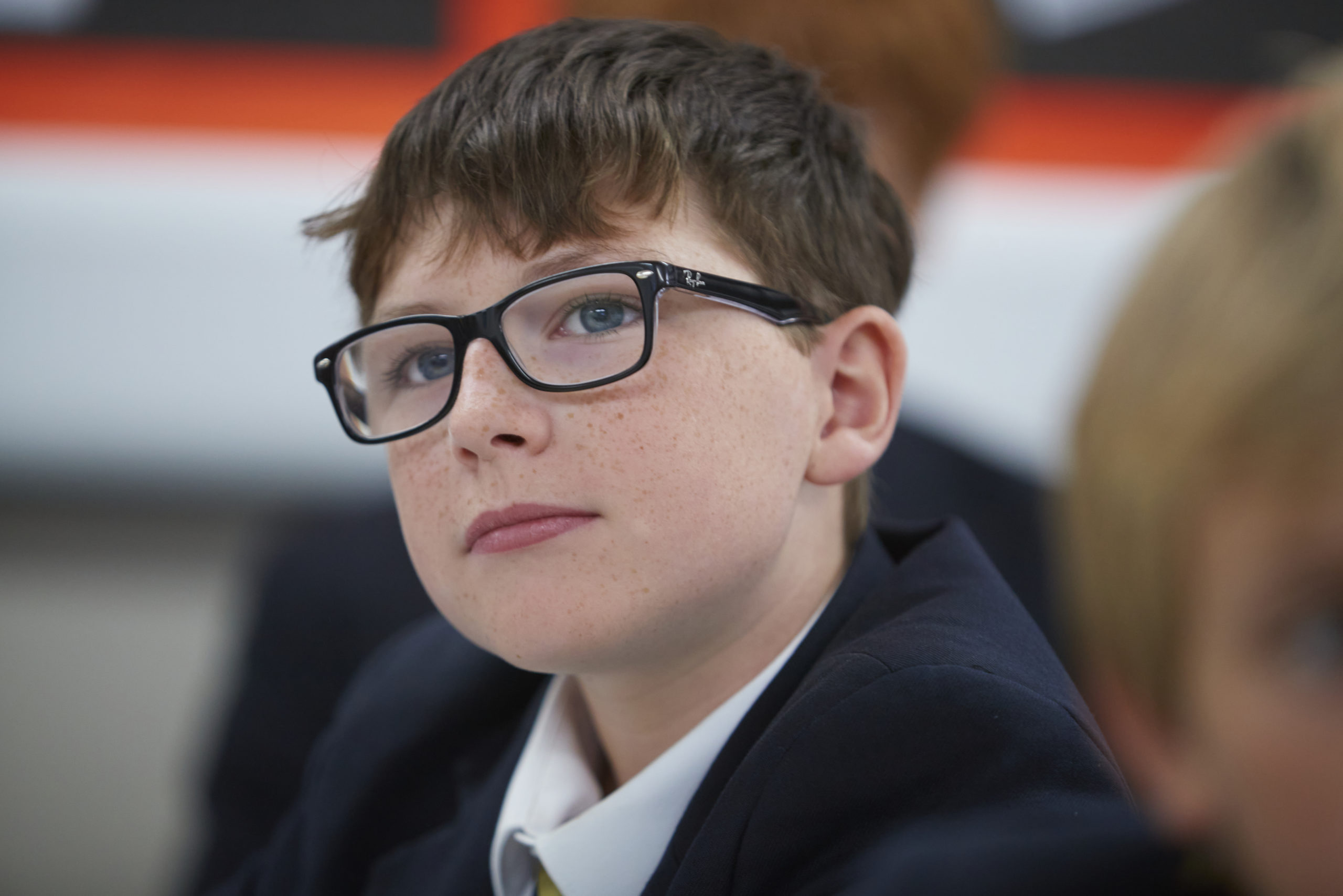 Senior School pupil looking confident and thoughtful in class