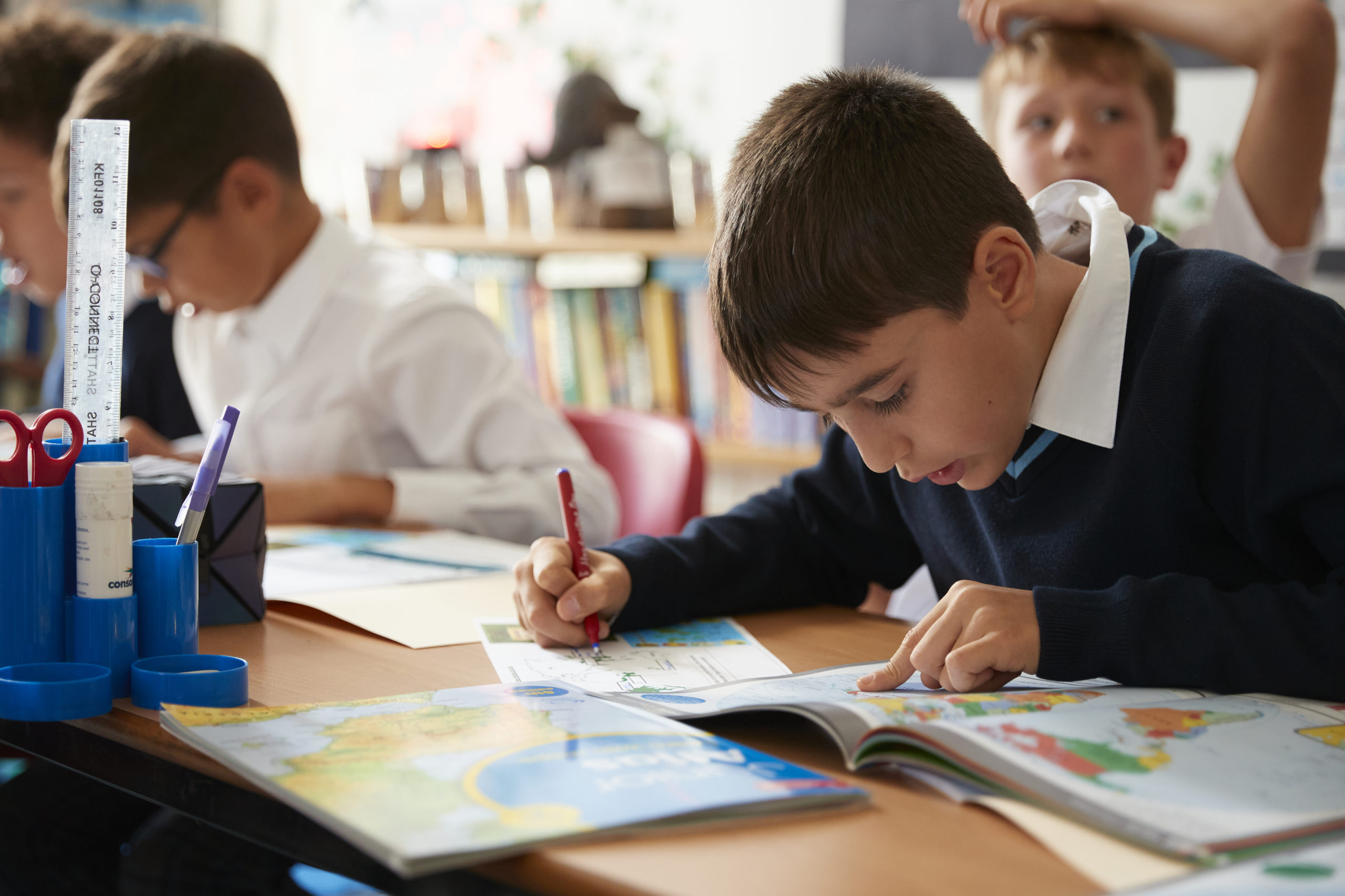 Prep boy working diligently in class - Scholarships and awards - Admissions