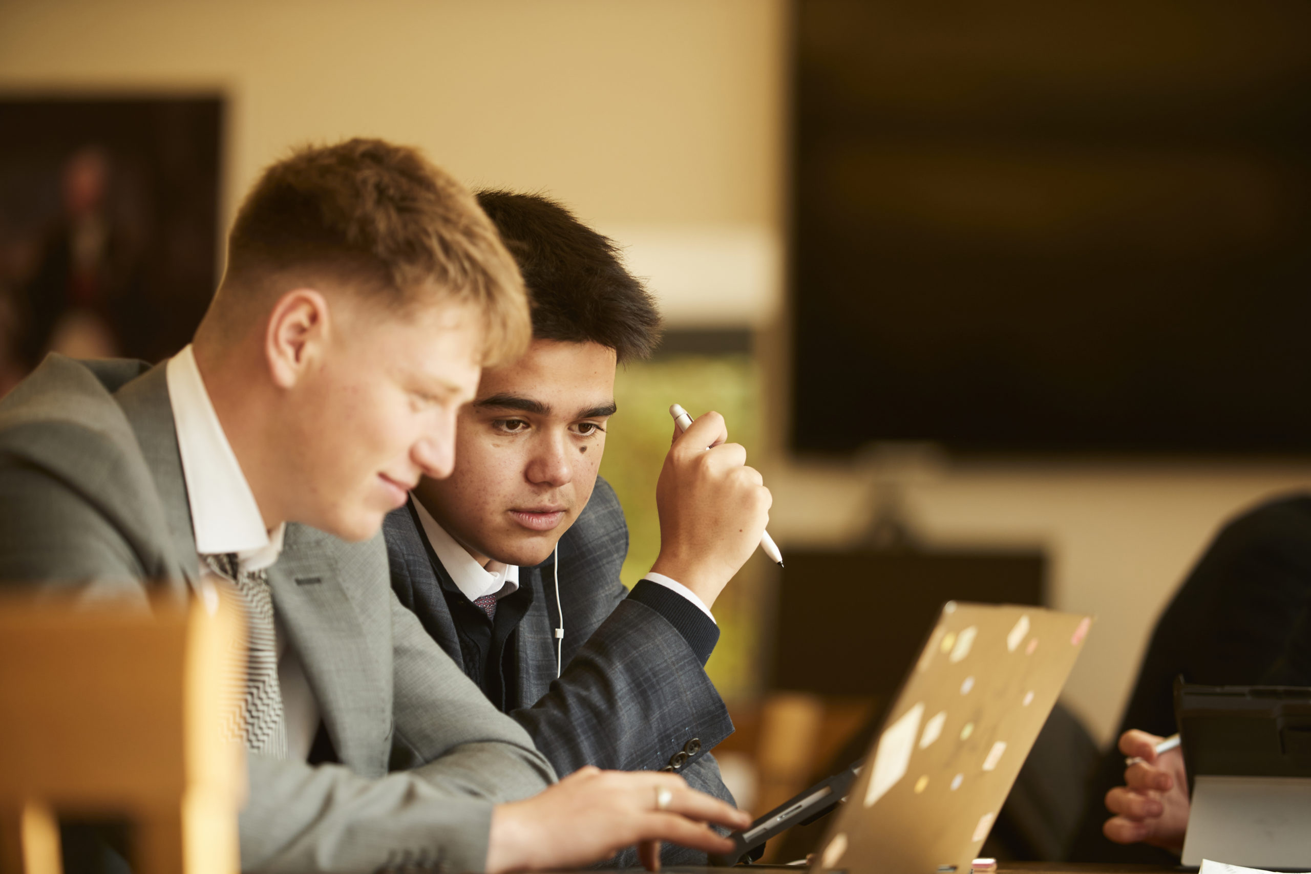 Senior School Sixth Form students working together - Careers and Higher Education Careers and Higher Education - A co-educational through school