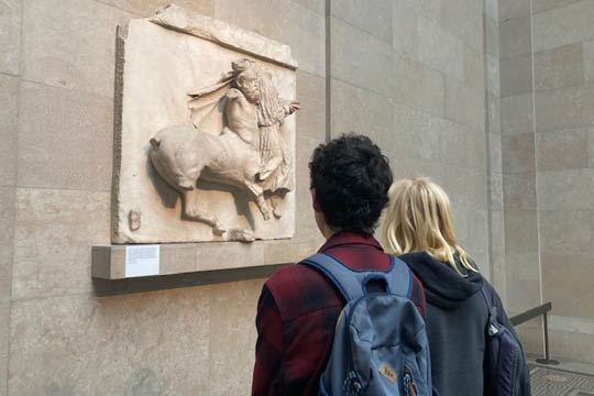 Senior School Pupils looking at a museum piece - Classics Trip to the British Museum - News