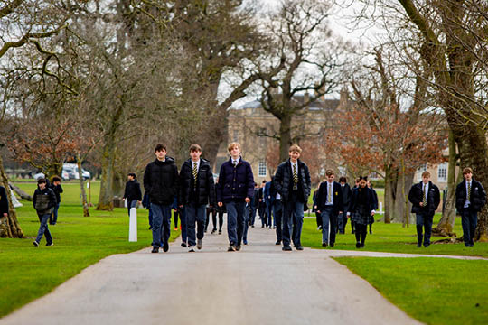 Senior School pupils walking through Cokethorpe School grounds - Fundraising for Ukraine - News