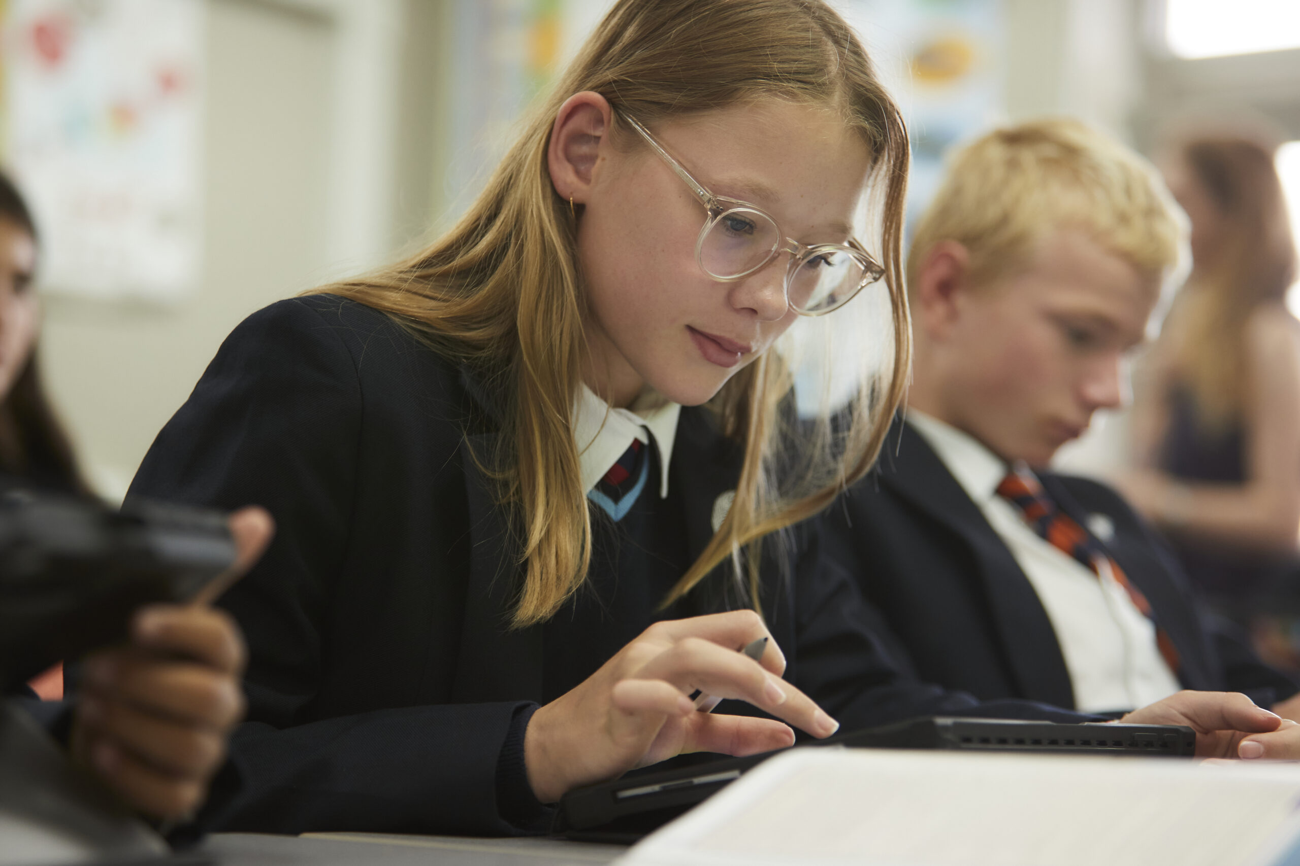 Senior School pupil looking confident and thoughtful in class