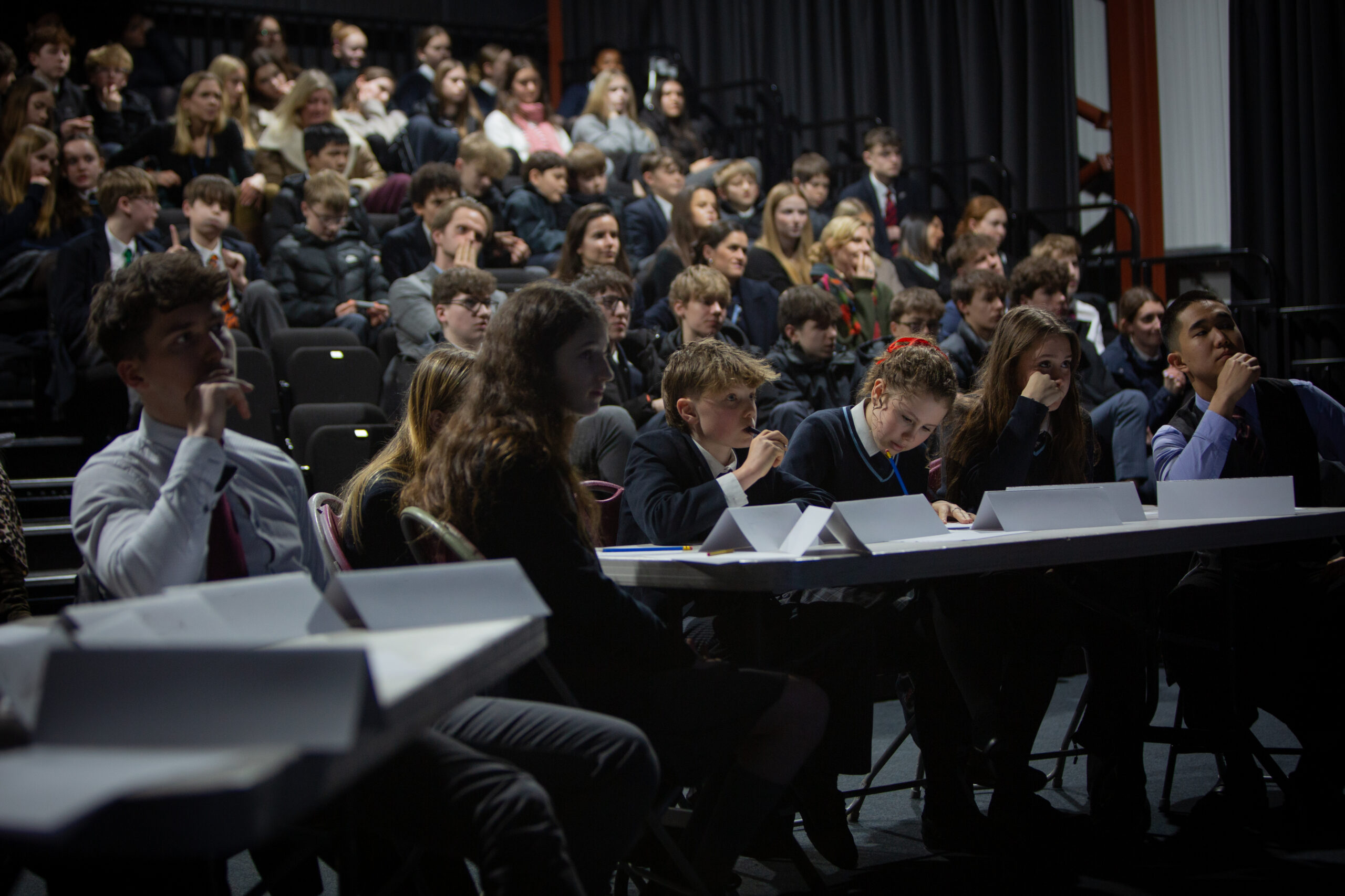 Inter-House Countdown Final attracts packed audience students competing in a school Countdown competition with a large audience watching on